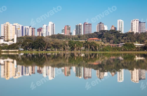 Preview: Mesmerizing view of high buildings reflected in the clear lake in Curitiba, Parana, Brazil