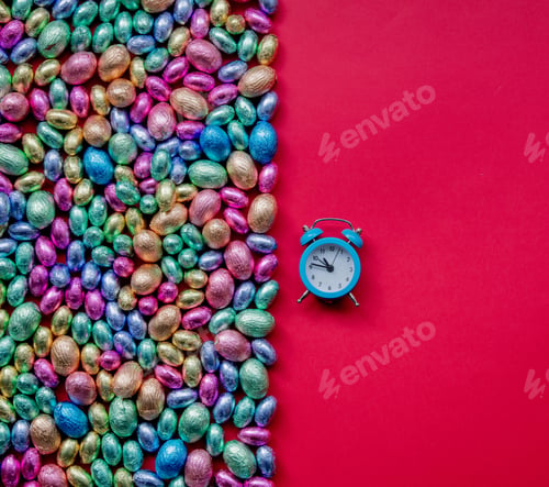Preview: color Chocolate Easter eggs and alarm clock
