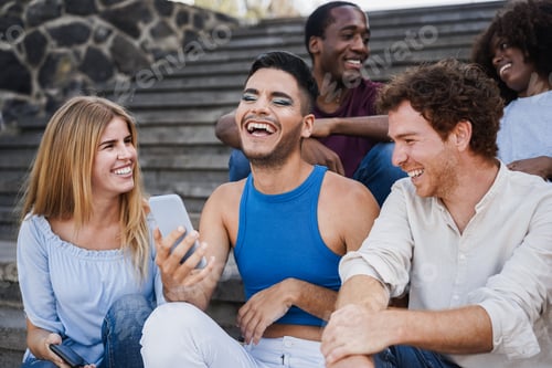 Preview: Young diverse people using mobile phones outdoor in the city - Focus on transgender man face