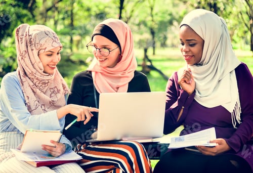 Preview: Group of islamic friends discussing and working together