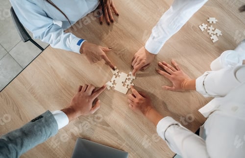 Preview: Top view of office workers that are playing puzzle game, conception of success