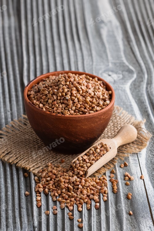Preview: Grain buckwheat on a gray wooden background