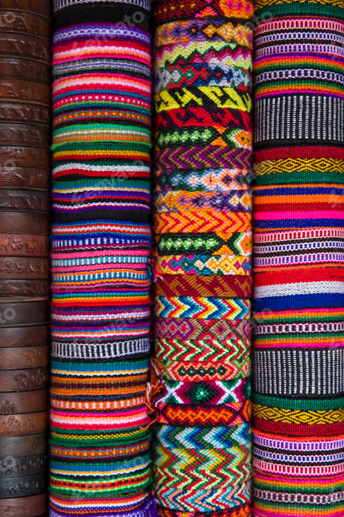Preview: Colorful traditional Bolivian fabrics on the market