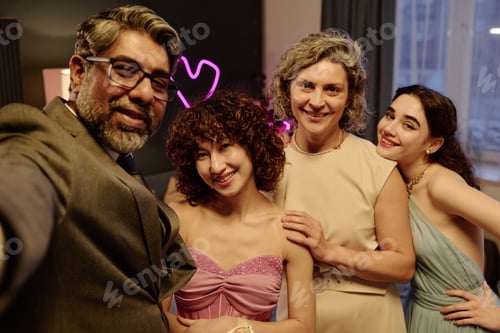 Preview: Multiethnic Group of Middle Aged and Young Adults Smiling and Posing Together