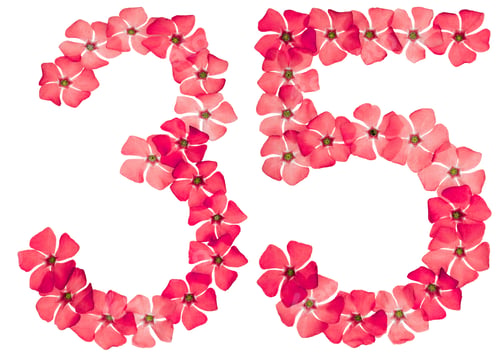 Preview: Numeral 35, thirty five, from natural red flowers of periwinkle, isolated on white background