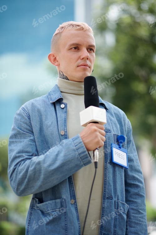 Preview: Journalist Speaking in Microphone