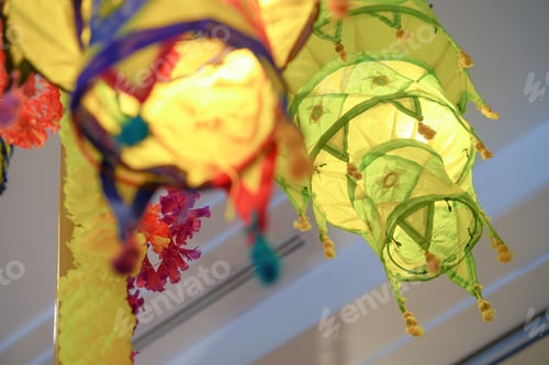 Preview: Low angle shot of an Indian fabric lantern decoration during the Deepavali festival