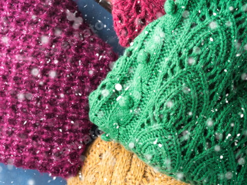 Preview: Winter womans woolen sweaters. Knitted clothing. Closeup