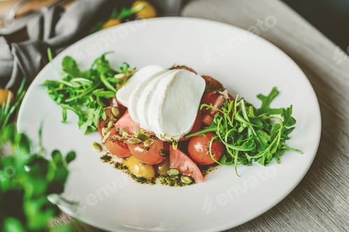 Preview: Vibrant, appetizing plate of assorted fresh fruits and vegetables, arranged in an artful manner