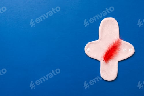 Preview: set of colorful bright reusable menstrual pads. zero waste woman periods concept top view