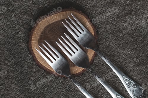 Preview: set of silver forks on the table