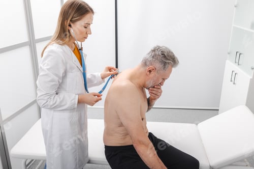 Preview: Pulmonologist auscultating lungs of senior patient, listening to wheezing with stethoscope during