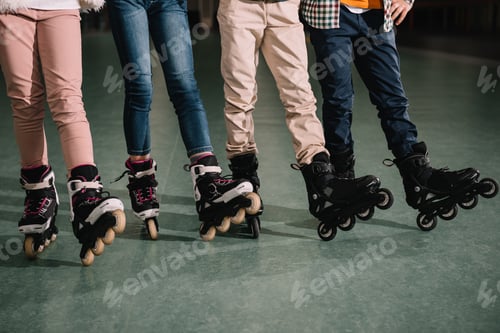 Preview: Partial view of children legs in roller skates
