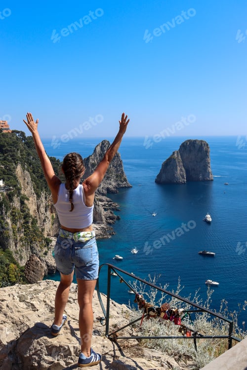 Preview: Young woman enjoys the view on the island of Capri.