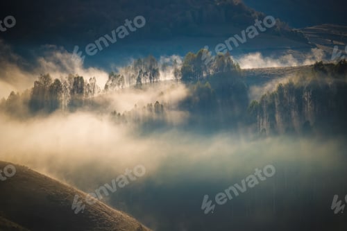 Preview: amazing foggy autumn landscape in the mountains
