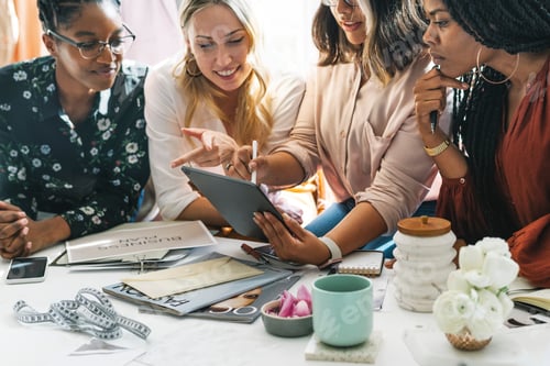 Preview: Fashion designers having a meeting using a digital tablet
