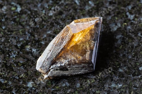 Preview: sample of twinned brown titanite crystal on black