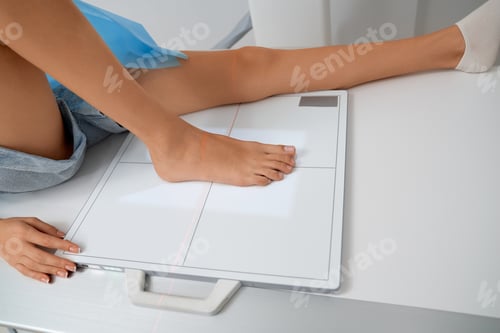 Preview: Female on ultrasound diagnostic of foot.