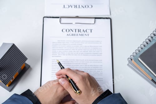 Preview: Real estate agent is reading and inspecting the sample homes and Business contract, lease, purchase,