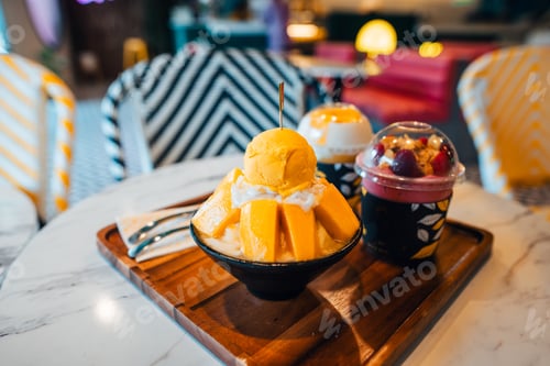 Preview: Mango ice cream in a cup at a seaside cafe