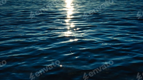 Preview: Dark ocean in early morning, dark blue waves with reflection,Backgrounds or marine themes