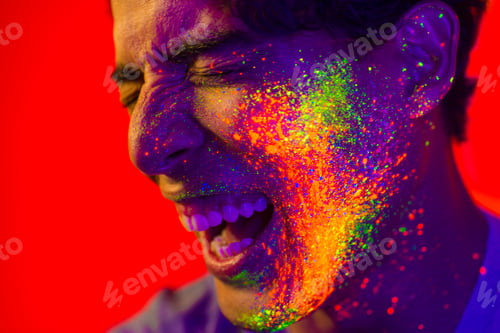 Preview: Fashion model with fluo painting on the face