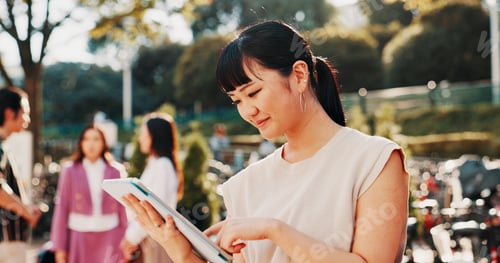 Preview: Japanese woman, city and smile with tablet for online networking, reading ebook or travel location