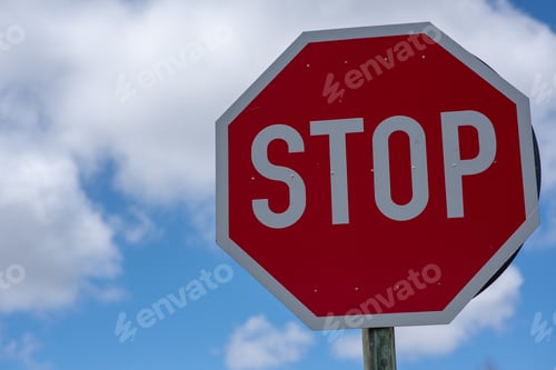 Preview: Close up shot of stop sign with clear blue skyline in background