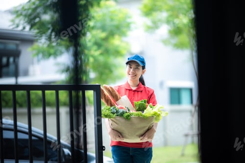 Preview: food delivery and courier service concept, Delivery staff in uniform