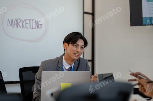 Preview: businessman is sitting working in a private office