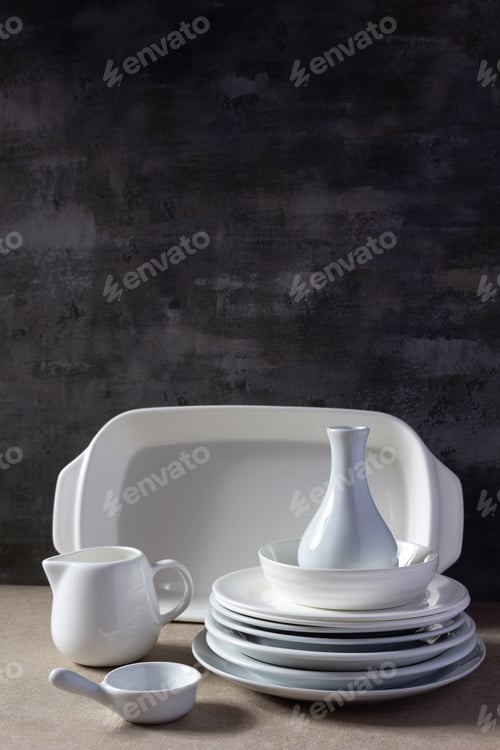 Preview: Empty crockery or ceramic dishes set. White kitchen dishware and tableware