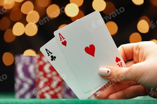 Preview: Female holding playing cards, playing poker at green table