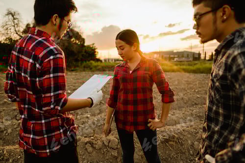 Preview: team of farmers conducting research on plants and soil by using plantations for quality agriculture.