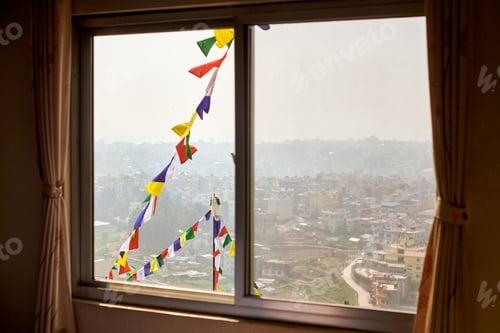 Preview: View of Kathmandu from hotel window through urban haze with lot of low rise buildings
