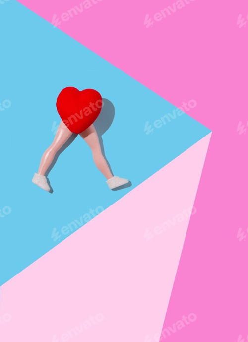 Preview: Vertical shot of a heart-shaped doll posing on a multicolor pastel background