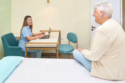 Preview: Doctor talking with an old woman in the clinic