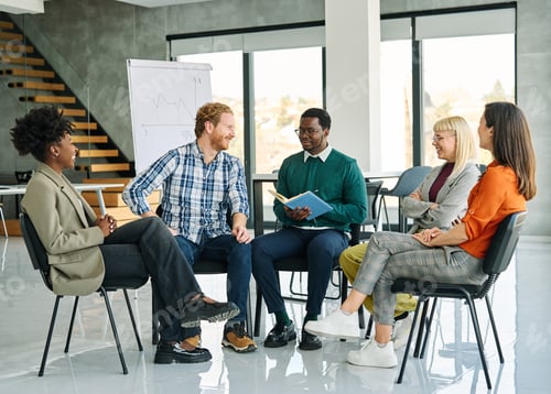 Preview: Portrait of busy business people meeting