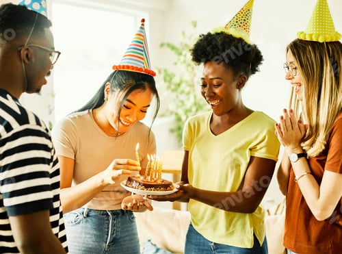 Preview: birthday celebration party cake happy candle blowing friendship fun friend woman home smiling