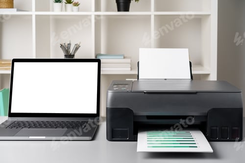 Preview: New modern printer and laptop in the office on table