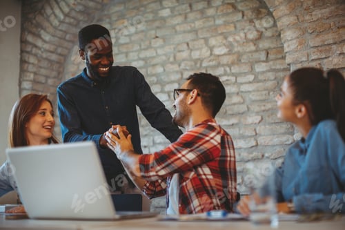 Preview: Good news handshake in the office