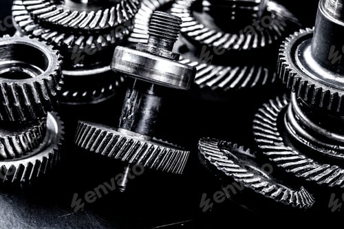 Preview: Metal gears on black background