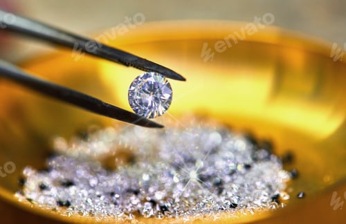 Preview: Diamond held by tweezers against the background