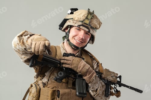 Preview: Smiling Man in Military Uniform Holding Assault Rifle