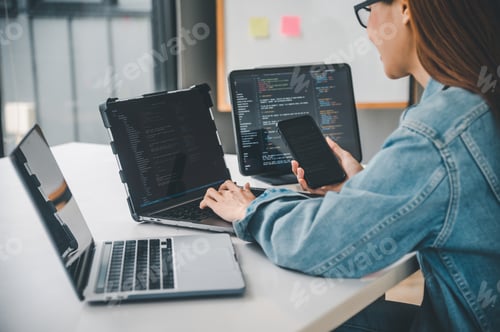 Preview: Female programmer working on coding, software development and web design.