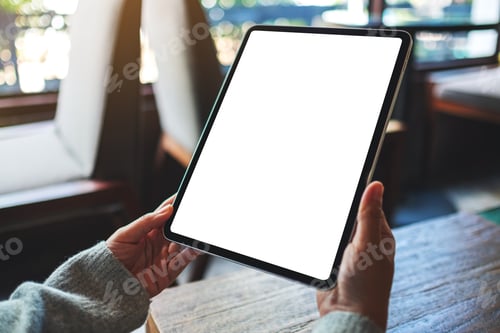 Preview: Mockup image of a woman holding digital tablet with blank white desktop screen