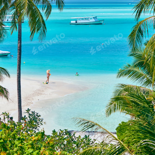 Preview: Three Year Old Toddler Boy On Beach With Mother. Summer Family Vacation At Maldives.