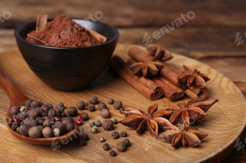 Preview: Aromatic anise stars and spices on wooden table