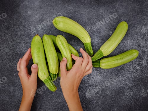 Preview: Fresh zucchini, green vegetables on local farmer market