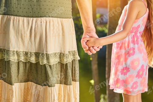 Preview: Grandmother with granddaughter holding hands