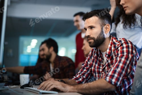 Preview: Programmer working in a software developing company